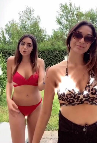 Cora & Marilu (@cora.e.marilu) #decote  #bikini  #biquíni vermelho  #piercing no umbigo 